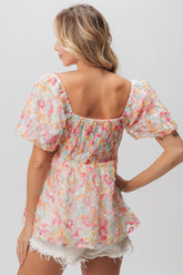 BiBi Multi Colored Flower Peplum Top in Coral/Apricot