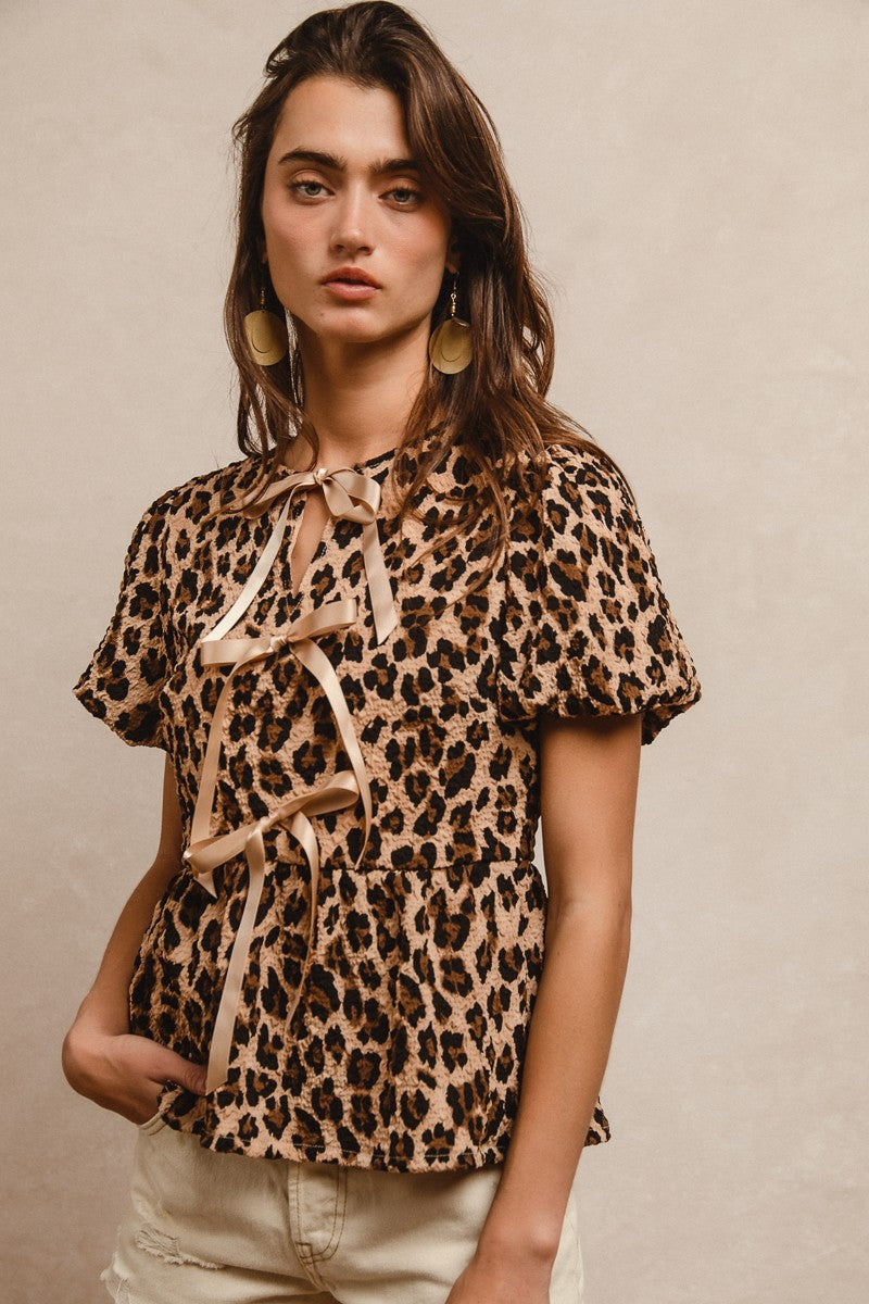 BiBi Textured Peplum Top with Ribbon Ties in Leopard