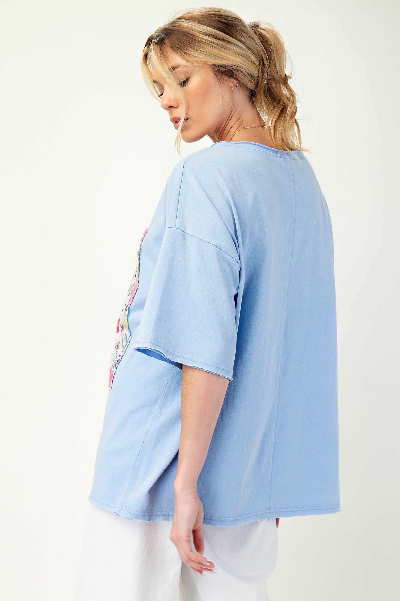 Easel Solid Color Knit Top with Raised Patchwork Front in Peri Blue
