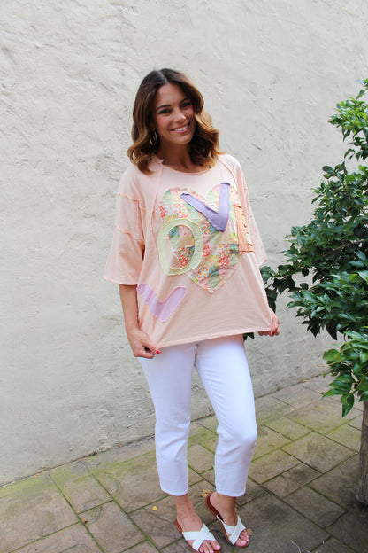 Easel OVERSIZED Heart and Love Patched Top in Peach