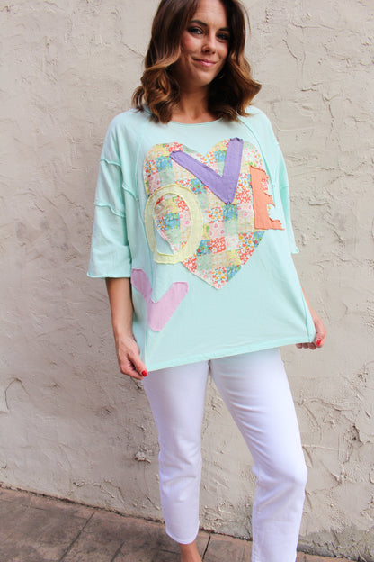 Easel OVERSIZED Heart and Love Patched Top in Mint Blue
