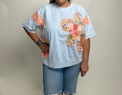 Easel Mineral Washed Color Block Flower Patched Top in Sky Blue