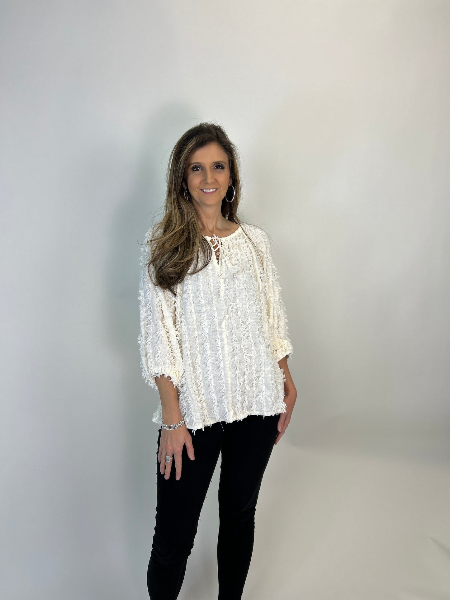 Easel Solid Color Textured and Frayed Top in Cream