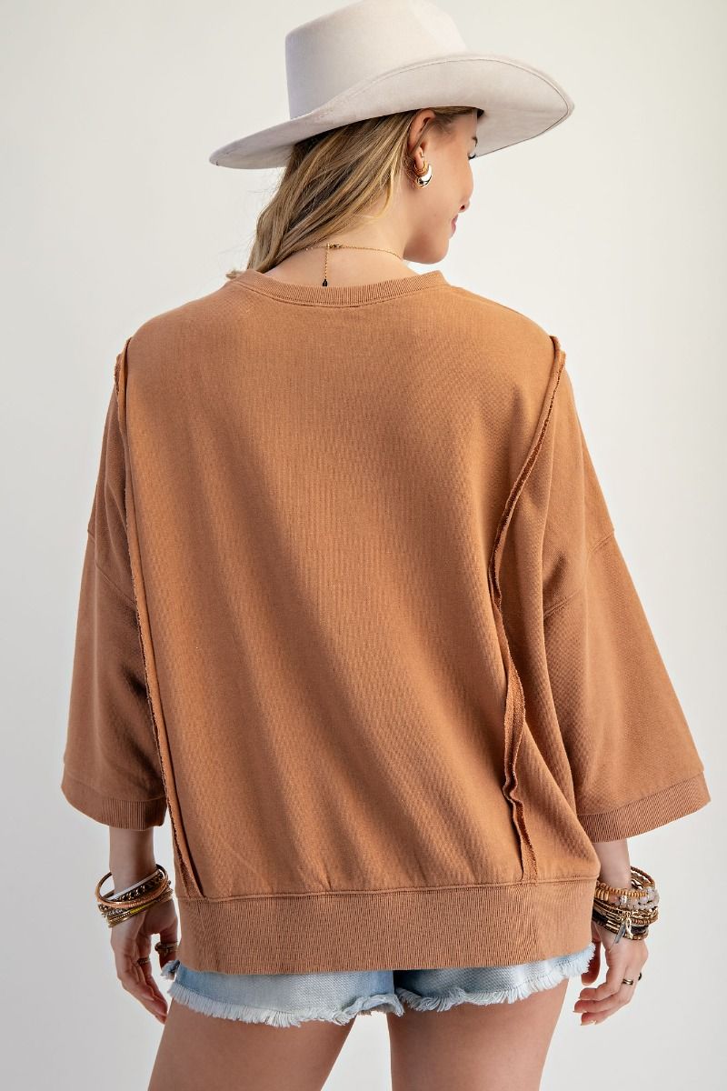 Easel Solid Color Terry Knit Top with Applique Bows on Hem in Camel