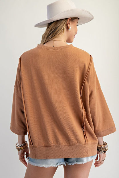 Easel Solid Color Terry Knit Top with Applique Bows on Hem in Camel